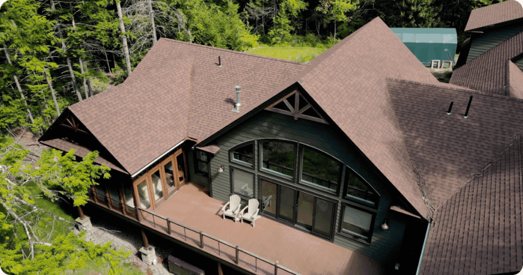 exterior painting on luxury big home by professional painters fromt hat 1 painter-brown roof and balcony with modern colors painted by house painters from that 1 painter