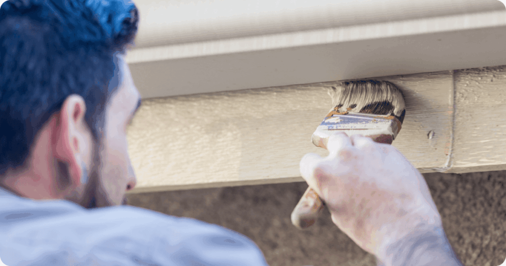 expert painter from that 1 painter painting the trim after a carpentry project