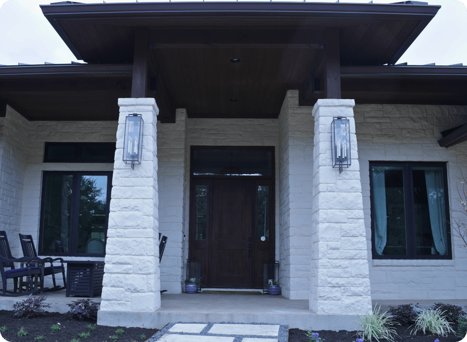 grand entrance to home with white brick painting done by that 1 painter