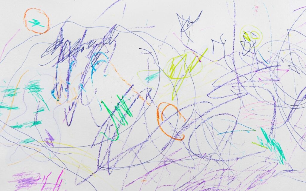 What Paint Finish Should I Use? Guide to Better Results 2 Crayon drawings all over a wall that was painted with a satin paint finish