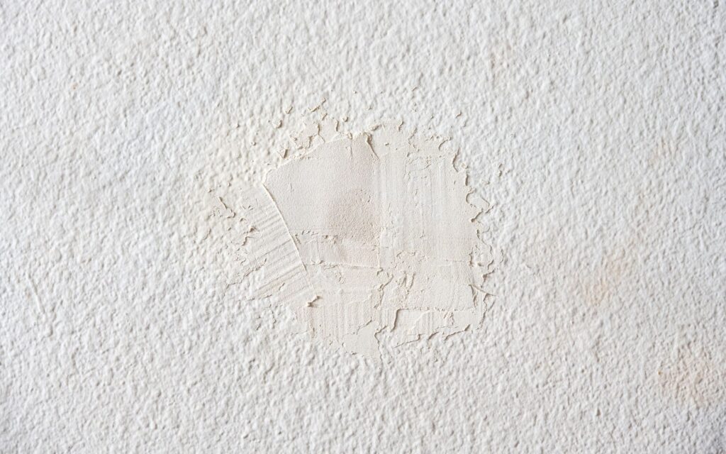 What Paint Finish Should I Use? Guide to Better Results 3 Patched drywall that can make you choose a different than normal paint sheen