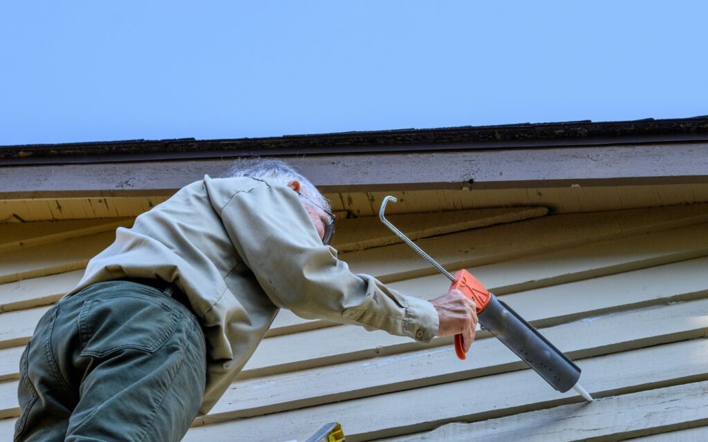 Can You Paint Vinyl Siding? Yes, If You Paint It the Right Way 2 Caulking siding